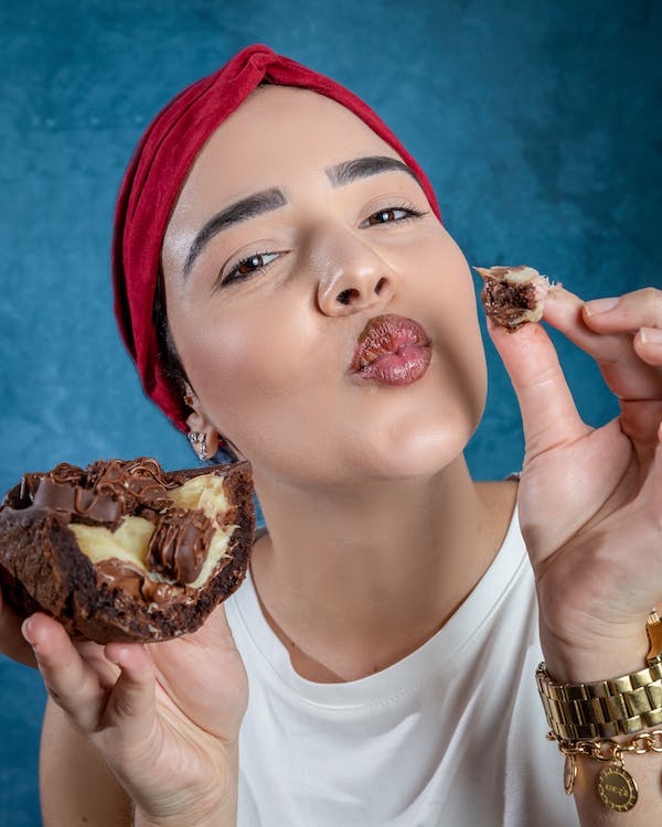 Woman Eating Chocolate Cake